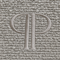 Load image into Gallery viewer, close up of the stone colour boucle fabric and embroidered pp monogram