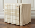 Load image into Gallery viewer, luxury dog crate cover in herringbone tweed and tartan fabric set against a white wood panelling wall and oak floor