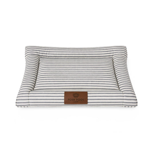 Striped posh poos dog crate mattress with a brown logo on a white background
