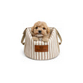 Load image into Gallery viewer, Small dog sitting in a striped pet carrier bag with 'Posh Poo' branding on a white background
