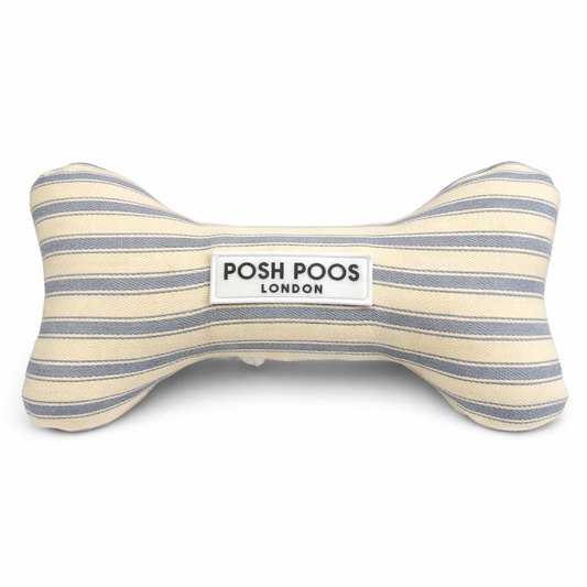 Striped bone-shaped dog toy with 'Posh Poos London' label on a white background