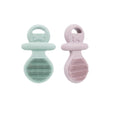 Load image into Gallery viewer, Two silicone puppy teething toys, one green and one pink, on a white background.
