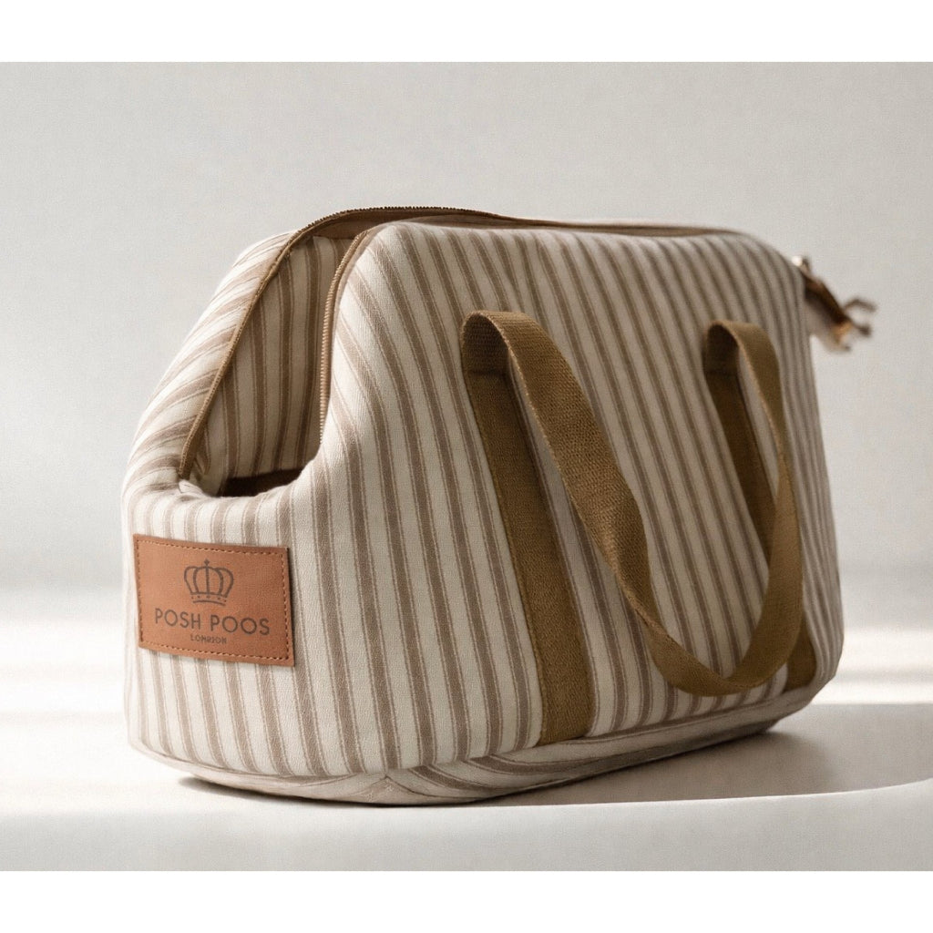 Striped dog carrier bag with 'POSH POOS' logo on a light background