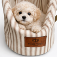 Load image into Gallery viewer, Small dog sitting in a striped pet carrier with 'Posh Poos' branding.
