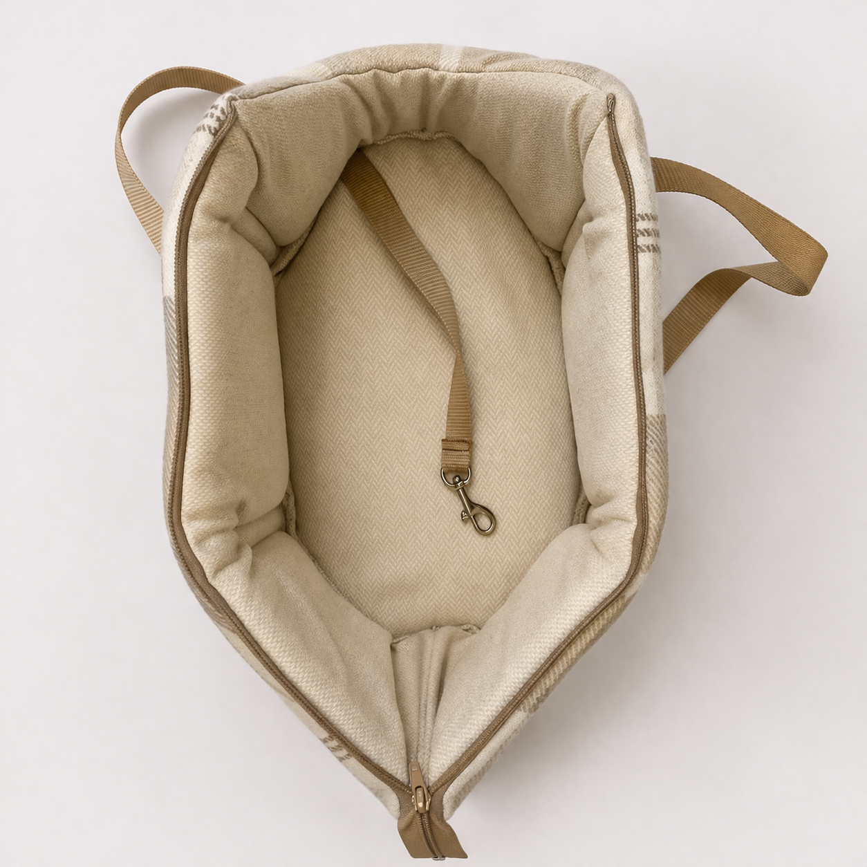 interior of.a cream herringbone and tartan tweed dog carrier bag