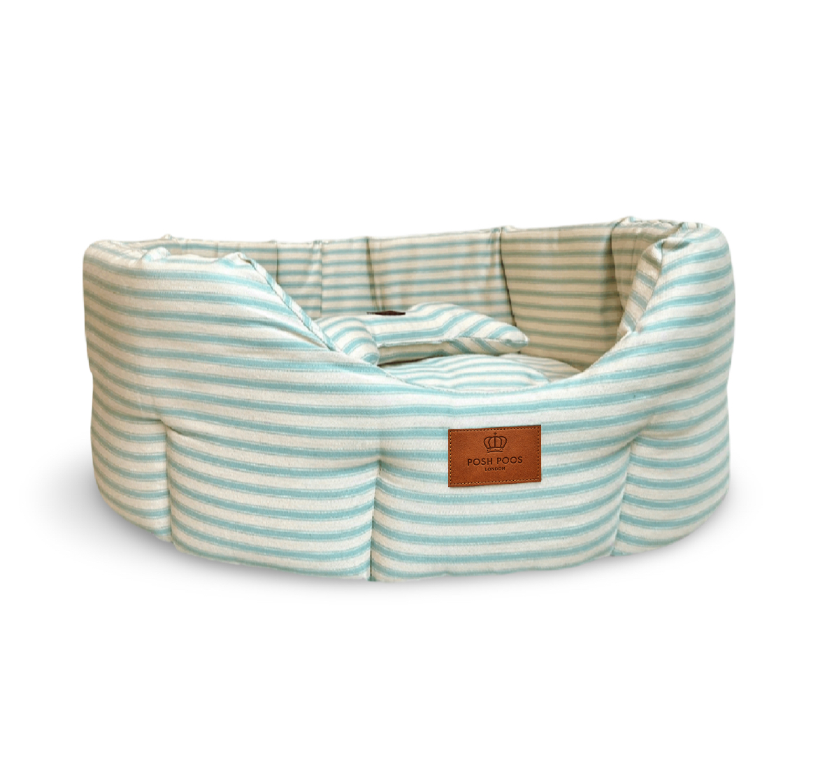 green striped dog bed with leather 'posh poos ' label 