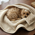 Load image into Gallery viewer, maltipoo puppy wrapped in a striped posh poos sherpa blanket 
